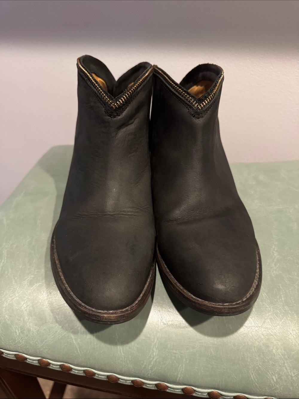 Very Volatile Black Leather Ankle Booties with Gold Trim